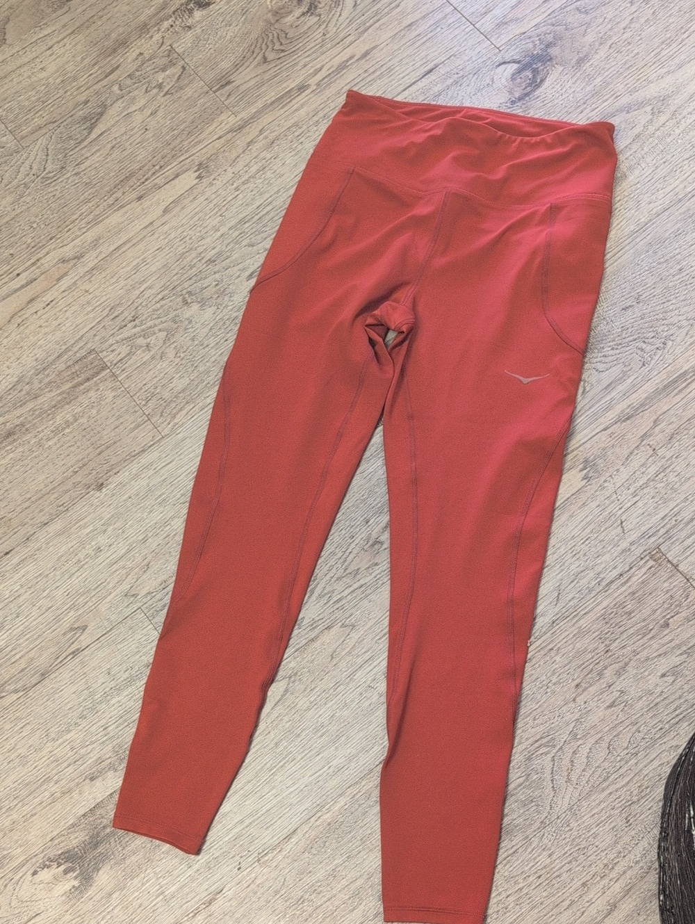 Hoka Legging Burnt Orange.